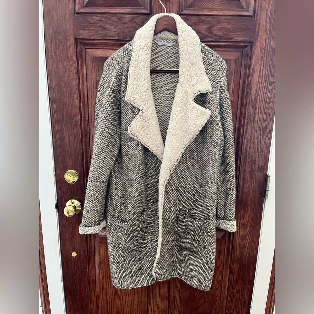Woman’s knit long coat.